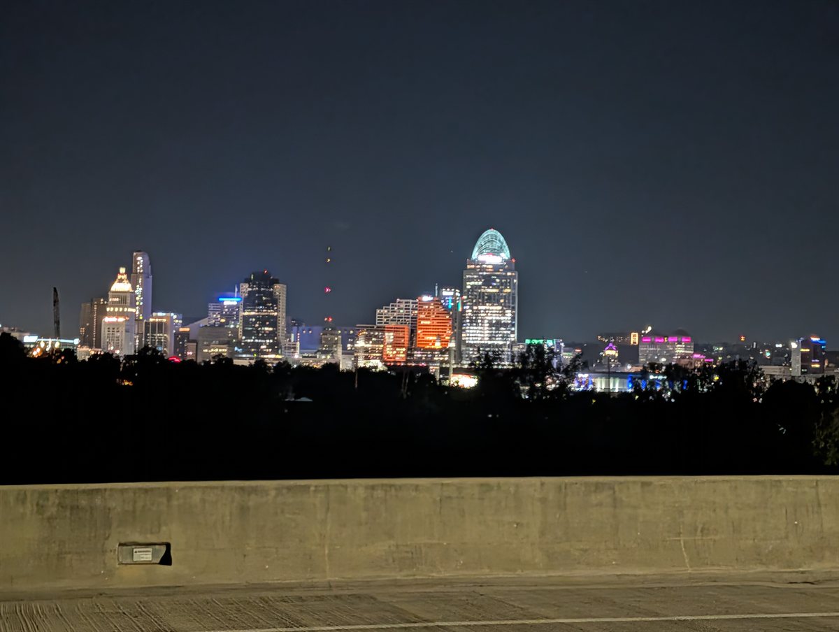 The Cincinnati skyline illuminated across the Licking River on Thursday morning before BLINK